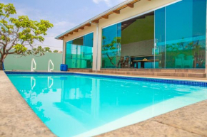 Casa com 3 suítes, mesa de sinuca, piscina aquecida e play ground para crianças
